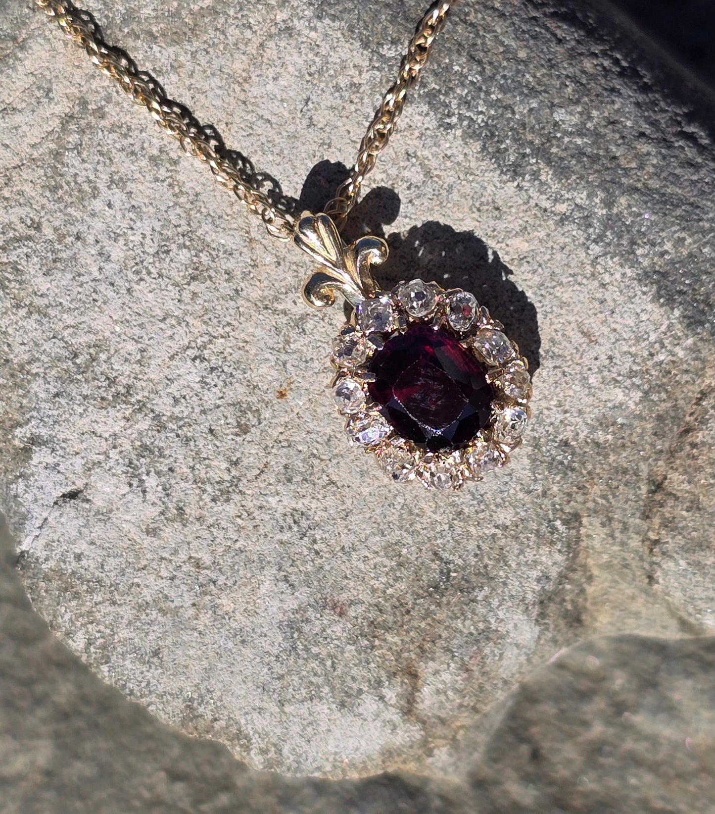14k gold garnet and mine cut diamond estate halo pendant necklace